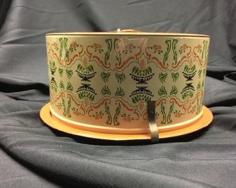 Vintage tin cake carrier, orange, cream, green and brown, ornate design, Ballonoff Cleveland, handle on top