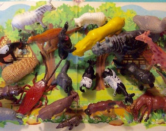 lot of plastic toy animals