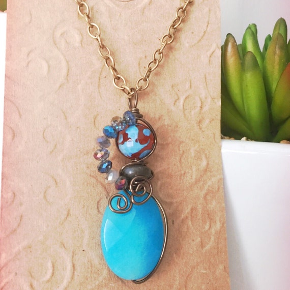 Items similar to 3 Stone Brass Wire Wrap Pendant, Blue, Brown on Etsy