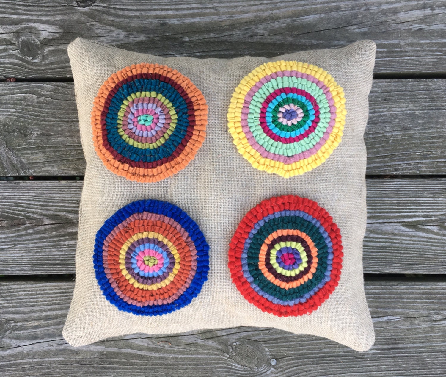 Hand Hooked Rug Four Circles Throw Pillow on Natural Linen