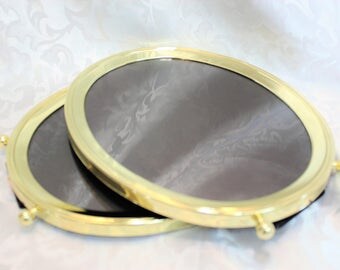 Two Large Oval Brass Picture Frames With Ball Feet