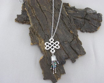 Celtic knot with sparkling flower silver chain