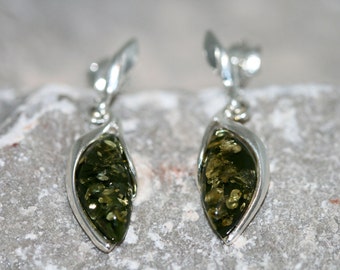Baltic amber earrings. Sterling silver and green amber earrings.