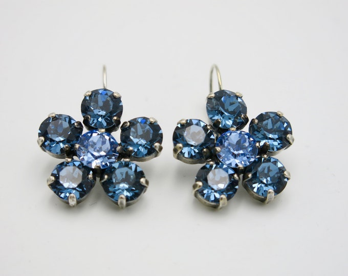 Blue sapphire Swarovski crystal flower earrings. Floral-inspired design resemble elegant drop dangle earrings perfect for a night out.
