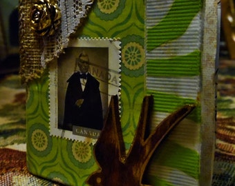 Tom Thumb Size Journal with decorative Paper and fold-outs.
