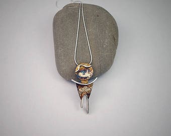 PE-95C. Pendant in oxidized sterling silver.