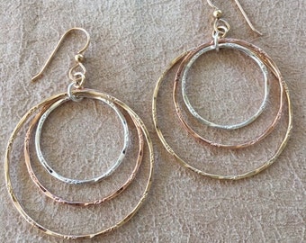 Tri-color silver and gold-filled hoops. Textured, sterling, 14k gold and rose gold-filled, light, airy, movement, gypsy soul, tribal.