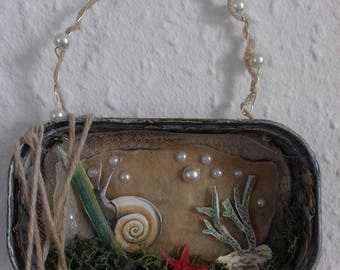 altered tin art. sea snail. mixed media,collage,assemblage art. wall art. whimsical.