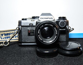 Items similar to Nikon N2020 35MM Slr Film Camera With Original Case on