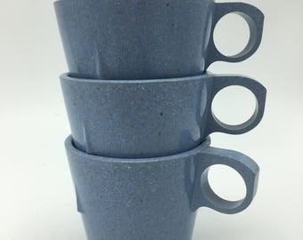 Blue splatterware style melamine stacked mugs marked 1986 . Vintage