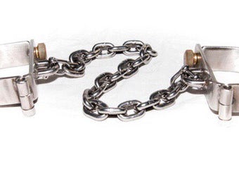 D - Manacles & removable chain.
