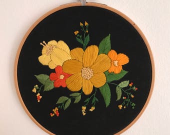 Flowers embroidered on black