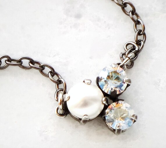 Delicate Swarovski crystal moonlight and white pearl three