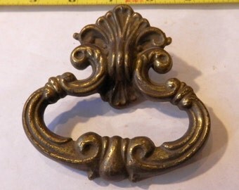 one (1) vintage brass drawer pull 1 1/4" on centers vertically