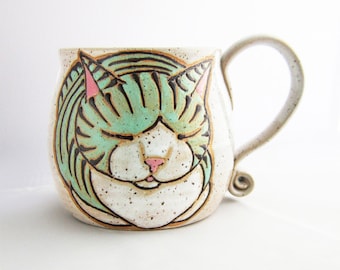 Cat Mug, pottery mug, great Christmas Day gift, cat loaf mug, cat art , holds approx 13 oz and is dishwasher and microwave safe.