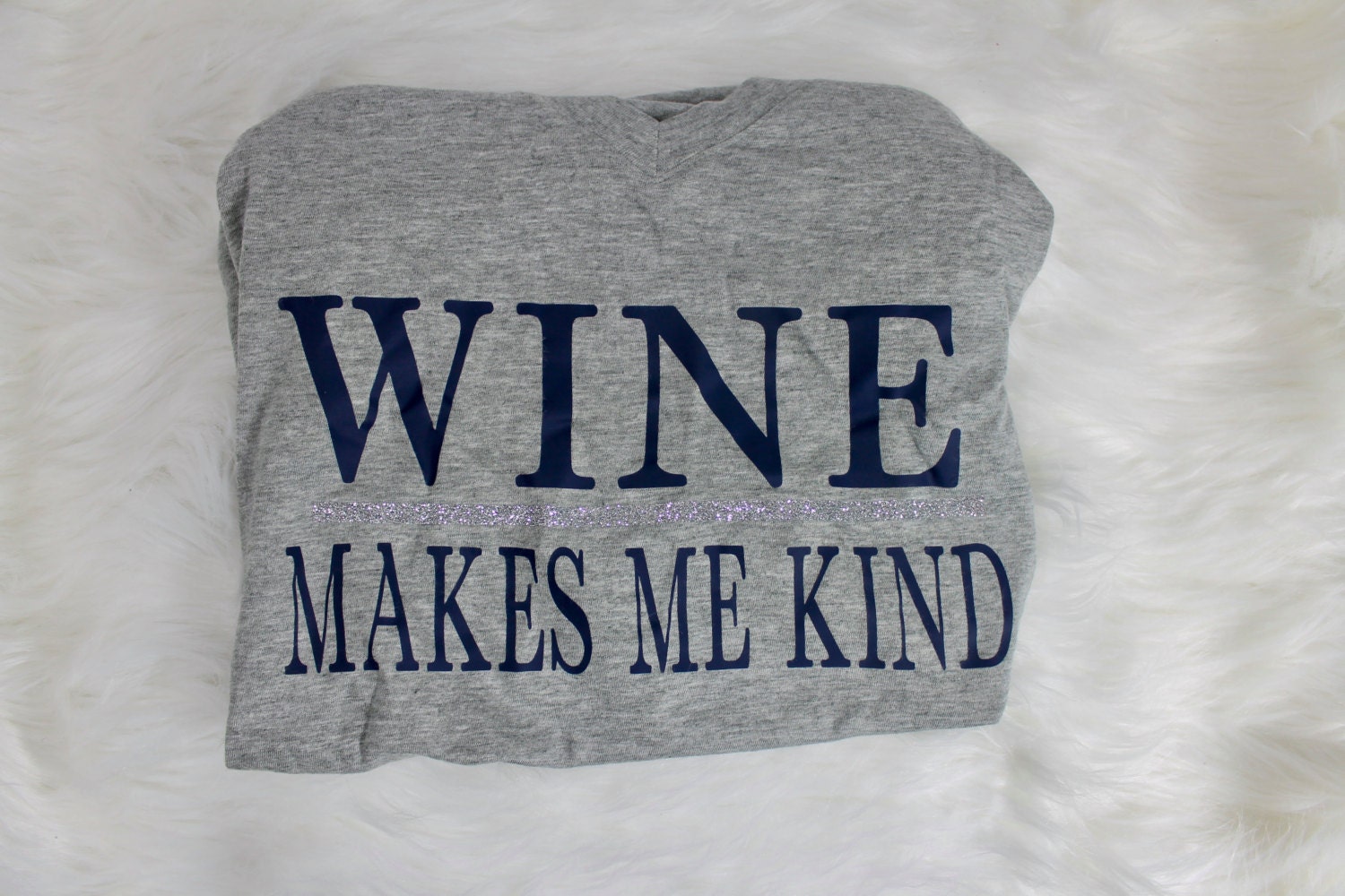 Wine makes me kind t shirt with navy blue writing