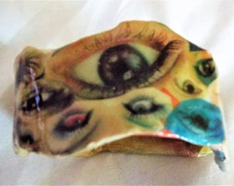 VINTAGE 1980's EYE Bracelet Hand Made in a paper mache design in a wavy edge all paper pics of Eyes very unusual