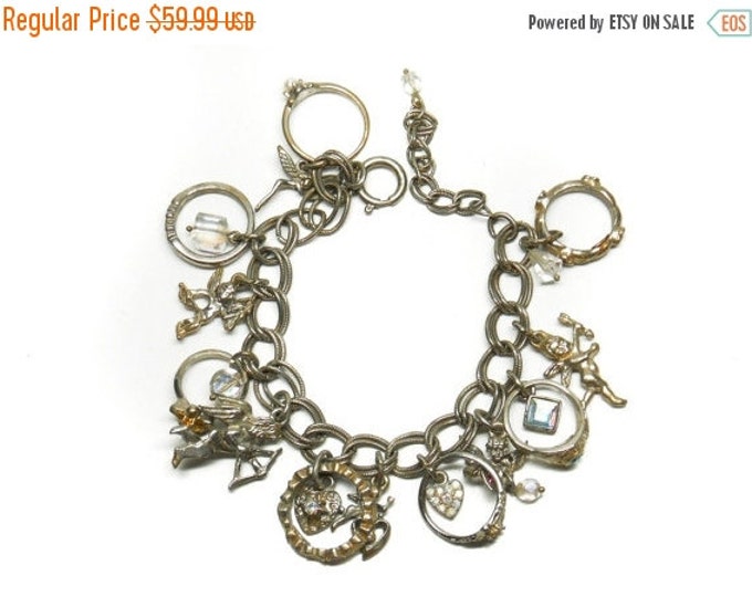 Storewide 25% Off SALE Vintage Silver Tone Kirk's Folly Designer Signed Charm Bracelet Featuring Assorted Rhinestone Accented Charms