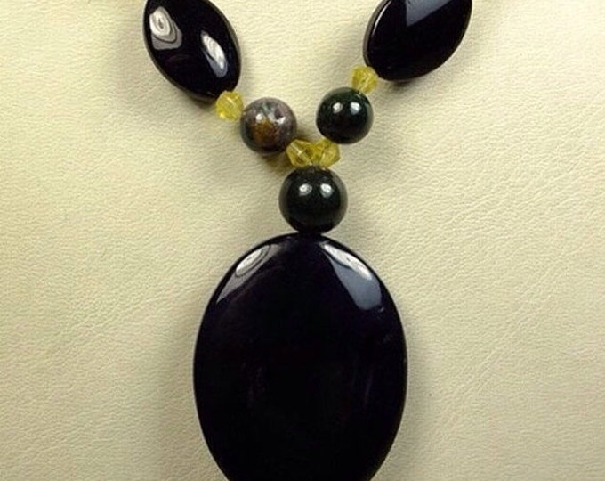 Storewide 25% Off SALE Designer Zumani Smoked Glass tribal pendant with full length necklace of black, green, and yellow beads