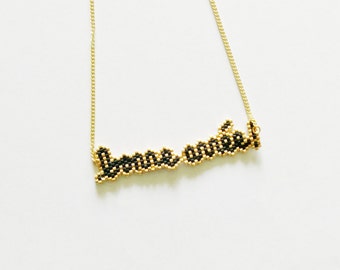 HAPPY new year NECKLACE hand woven black and gold nib