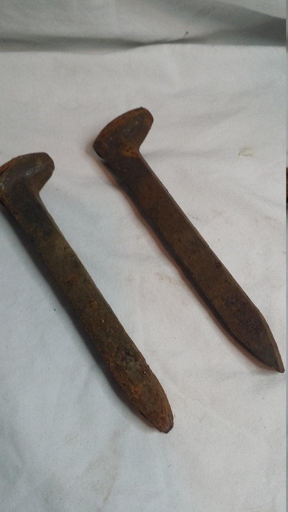 Railroad stake. Railroad nail. Old nail. Vintage nail. Antique