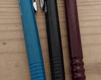Three vintage retractable pencils, rotring and pentel