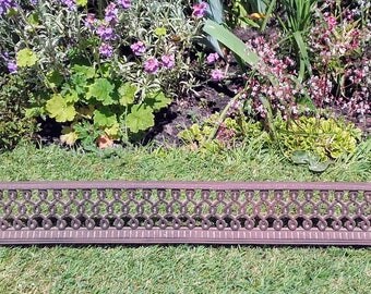 Antique cast iron curb fireplace fender