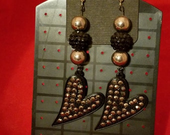 Rockin Heart Earrings! Blinged out, dangle Heart Earrings. They dangle almost 4 inches. Gems are gunmetal grey! Silver & Black Spiked Beads.