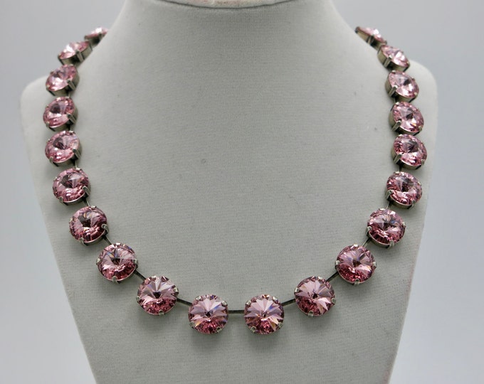 Make a statement on your wedding day or any other occasion with this eye catching light rose pink Swarovski® crystal collar necklace.