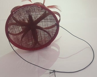 Sinamay fascinator on a comb