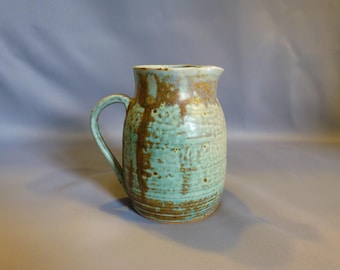 Light turquoise pitcher