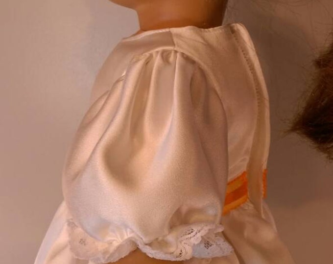 White satin dress with orange flowers and trim. - fits 18" dolls