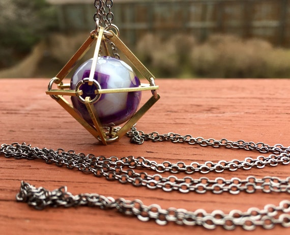 Amethyst Caged In Brass Necklace