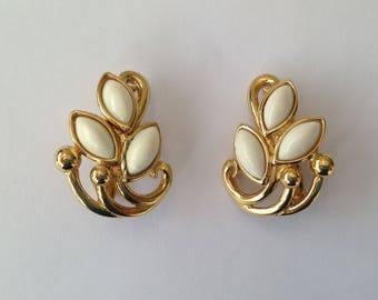 Vintage 1960s Trifari Goldtone and White Cabochon Clip On Earrings.