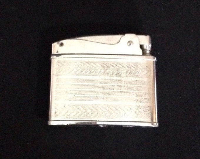 Storewide 25% Off SALE Vintage Stainless Steel Refillable Gibson Branded Patterned Lighter Featuring Sleek Design Lines With Push Tab Mechan