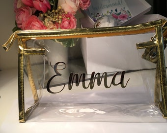 Personalized clear cosmetic bag. Zipper closure, clear vinyl makeup bag monogrammed or personalized with "bride" or bridesmaid's names.