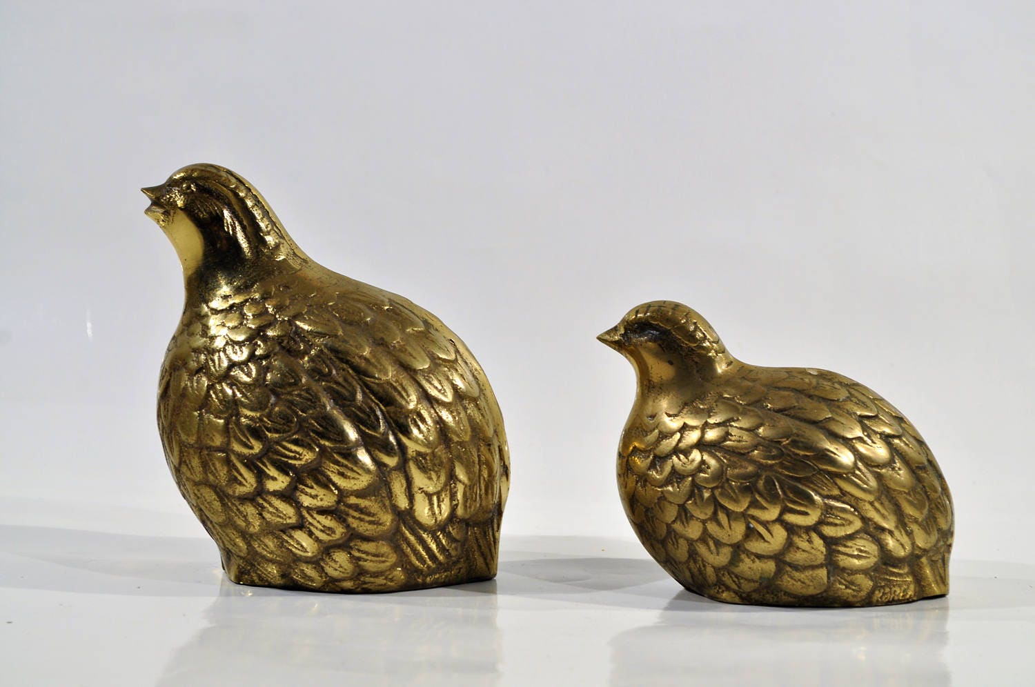 quail family figurines