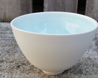 Wheel Thrown Porcelain Bowl with Ice Blue Glaze and Naked Exterior