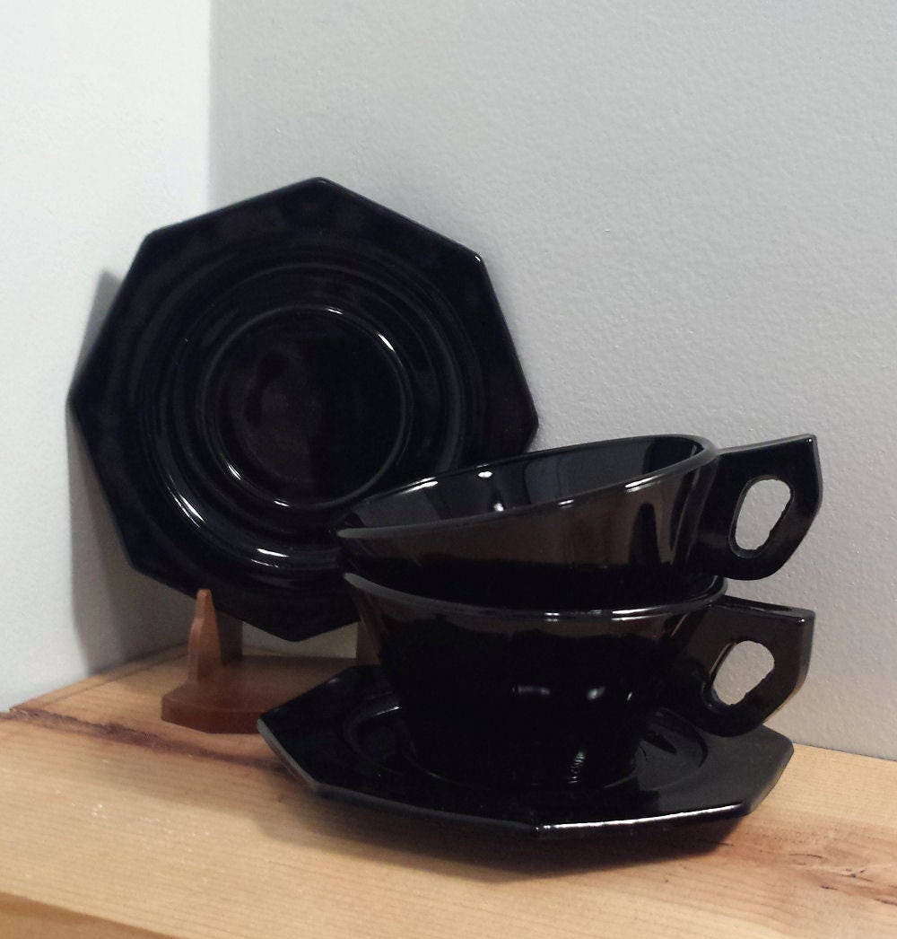 U.S. Scroll Black Glass Teacup and Saucer Set 4 piece vintage
