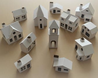 Pack of 12 DIY Putz style glitter houses. Unassembled corrugated cardboard houses. Make your own decorative house vilage