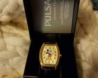on hold DO NOT PURCHASE Mickey Mouse Watch by Pulsar Still in original box with tags still attached to the watch