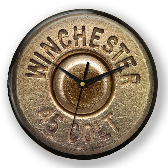 Items similar to Winchester 45 colt bullet back wall clock, perfect