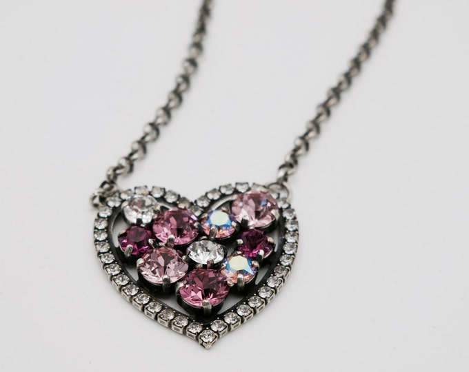 Limited edition necklace that you will want to wear for years to come! Swarovski crystal pink heart pendant.