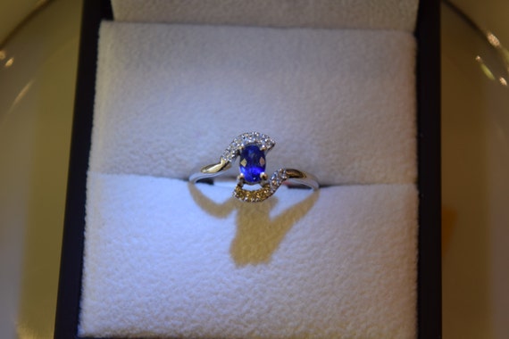 simple elegant blue sapphire engagement ring