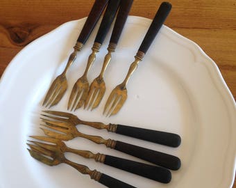 8 dessert forks brass and wood
