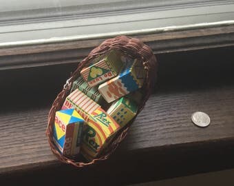 8 miniature boxes of food and house items.