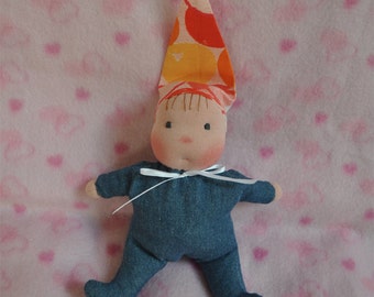Fretta's original Waldorf Style Weighted Baby. 9" / 23 cm soft sculpture Cloth Doll. Baby's First Doll. Child Friendly Baby Doll.