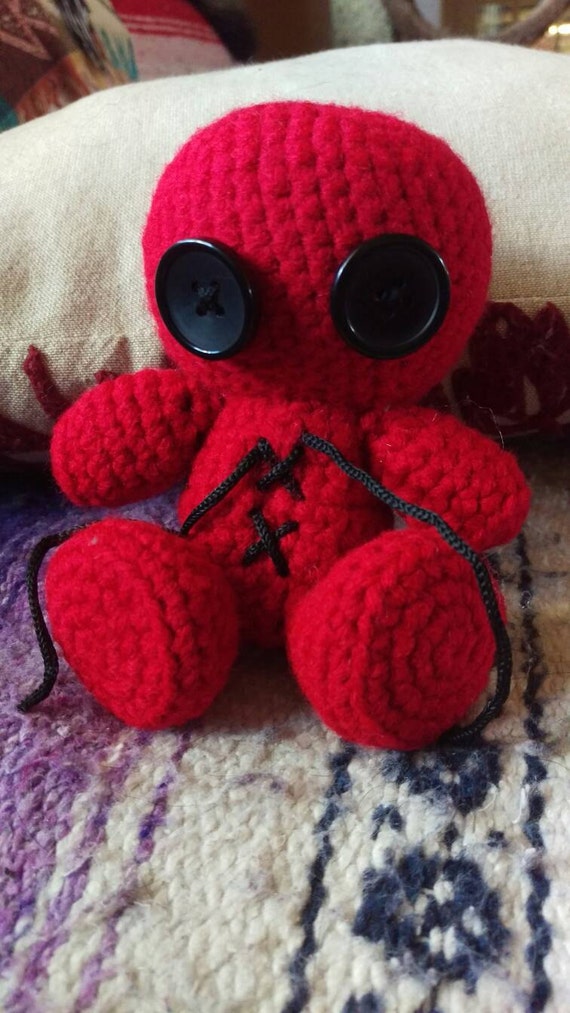 red voodoo dolls