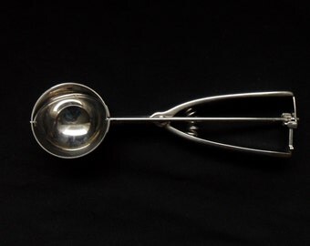 Ice cream scoop vintage 1950s by INOX is stainless steel in excellent condition