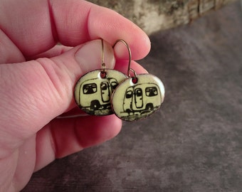Yellow enamel on copper earrings. Caravan. Jewel inspired by nature and camping. Shaped oval. Titanium earwires